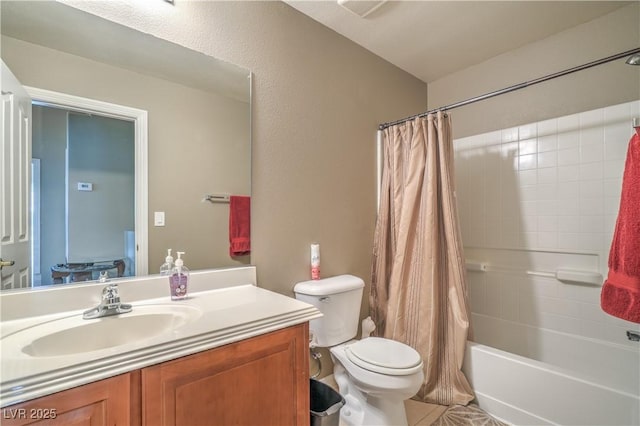 bathroom featuring vanity, shower / tub combo, toilet, and tile patterned flooring