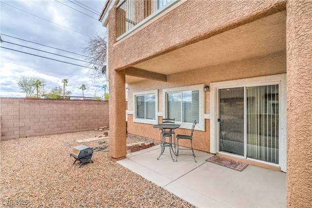 view of patio / terrace with fence