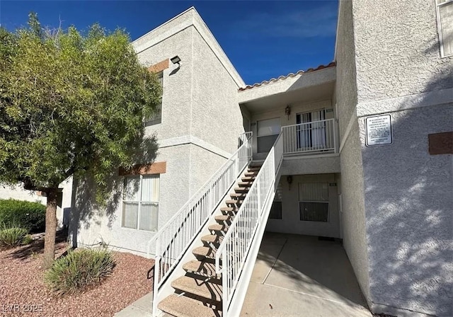 view of building exterior featuring stairs