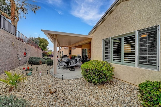 view of patio with fence