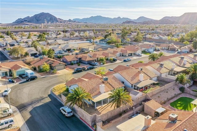 bird's eye view featuring a mountain view and a residential view