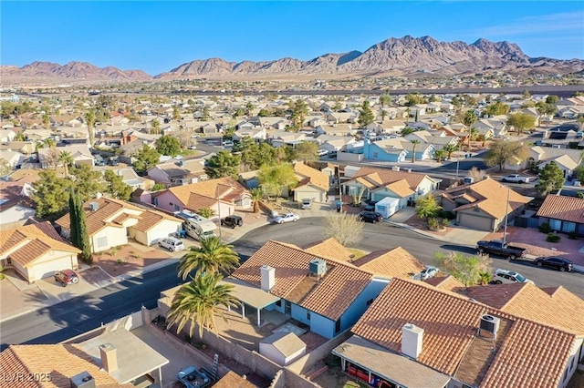 drone / aerial view featuring a mountain view and a residential view