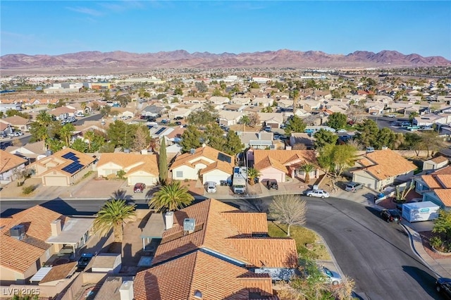 bird's eye view with a mountain view and a residential view