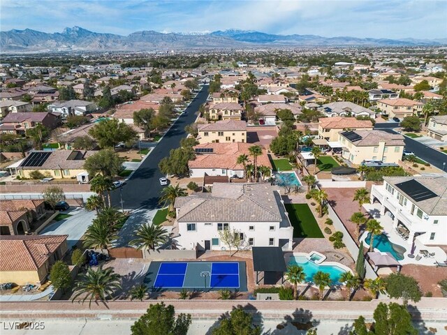 drone / aerial view featuring a mountain view and a residential view