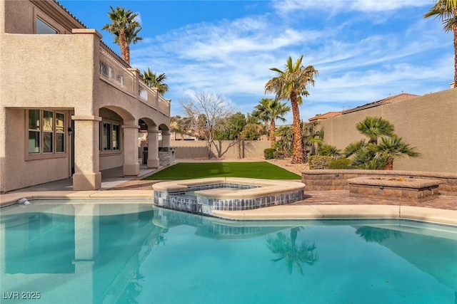 view of pool featuring a fenced in pool, an in ground hot tub, and a fenced backyard