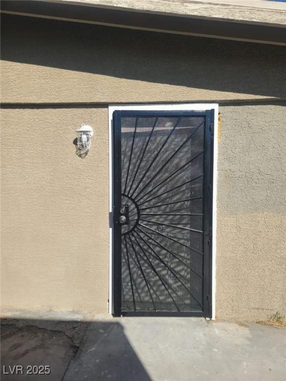 exterior space featuring stucco siding