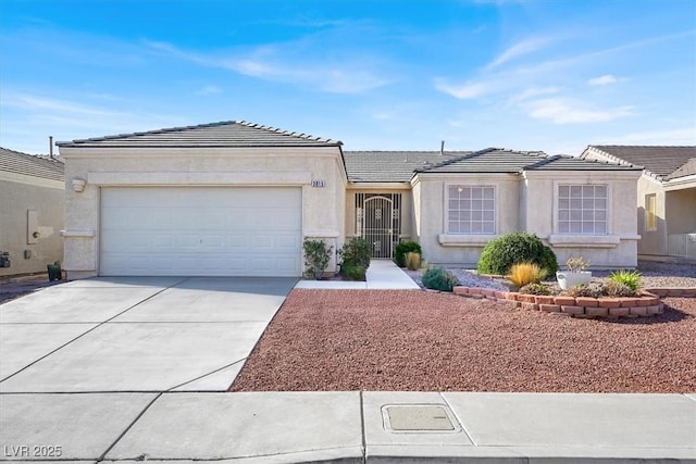 ranch-style home featuring stucco siding, a garage, driveway, and a tile roof