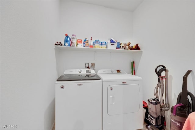 laundry area with laundry area and separate washer and dryer