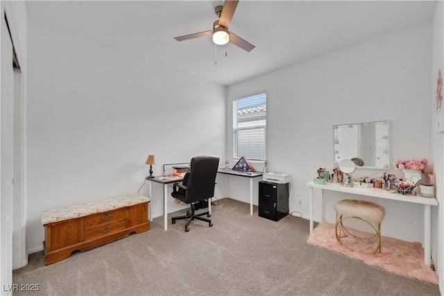 office featuring light colored carpet and a ceiling fan