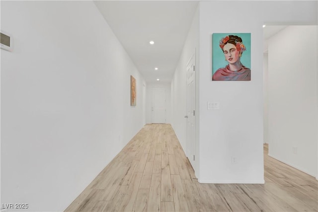 hall featuring recessed lighting and light wood finished floors