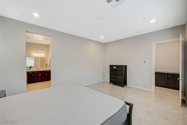 bedroom featuring visible vents, connected bathroom, baseboards, recessed lighting, and light tile patterned flooring