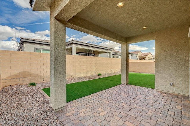 view of patio with a fenced backyard