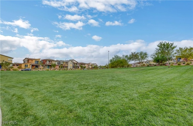 view of yard featuring a residential view