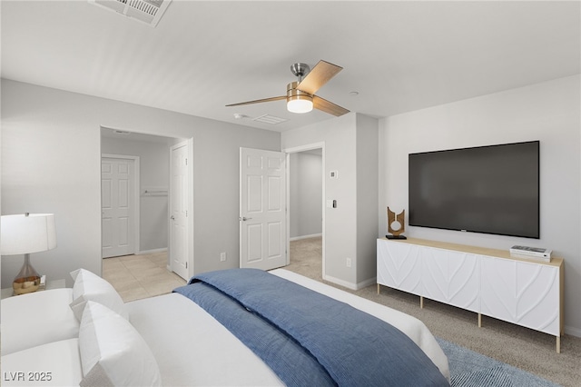 bedroom with light carpet, visible vents, ceiling fan, and baseboards