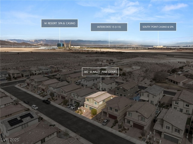 bird's eye view with a mountain view and a residential view