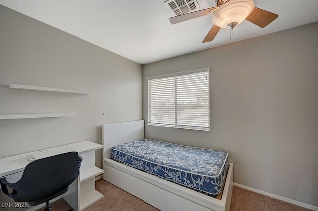 bedroom featuring baseboards, ceiling fan, and carpet flooring