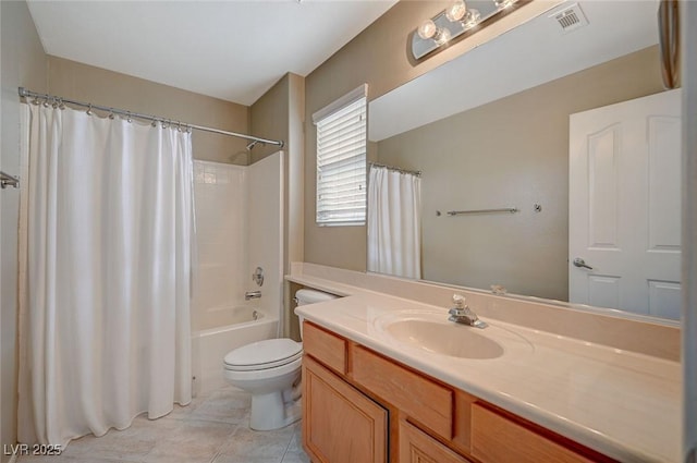 bathroom with vanity, visible vents, tile patterned flooring, shower / bath combination with curtain, and toilet