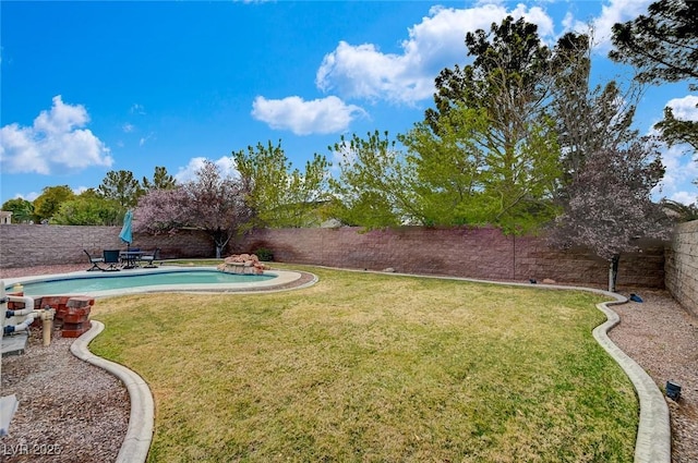 view of yard featuring a fenced backyard and a fenced in pool