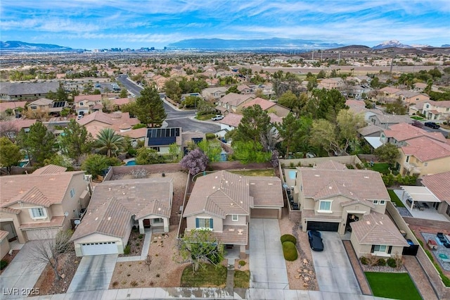 bird's eye view featuring a mountain view and a residential view