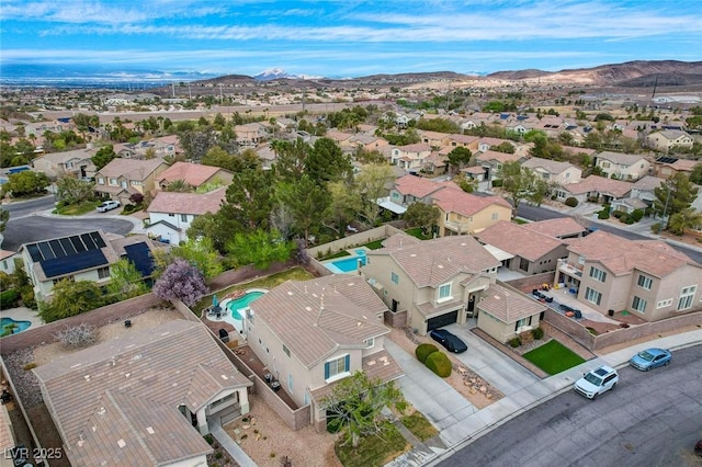 birds eye view of property featuring a residential view and a mountain view