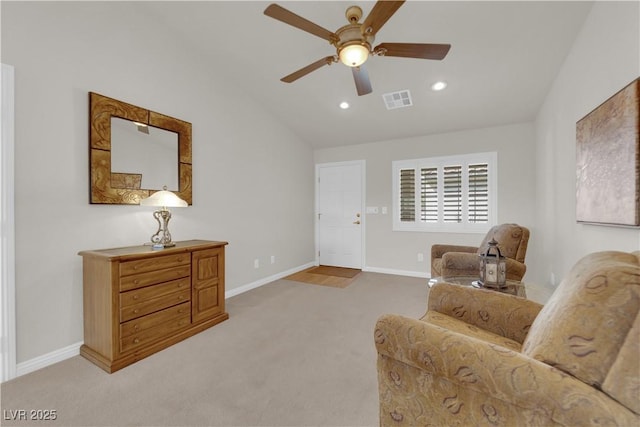 sitting room featuring visible vents, baseboards, lofted ceiling, light carpet, and recessed lighting