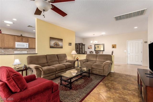 living room featuring visible vents, recessed lighting, and ceiling fan with notable chandelier