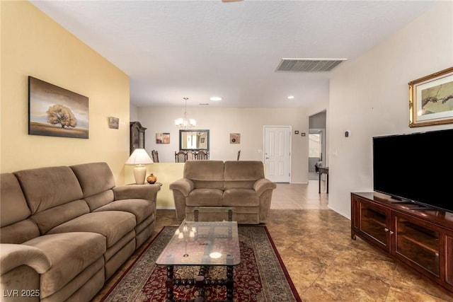 living room with a notable chandelier, visible vents, recessed lighting, and baseboards