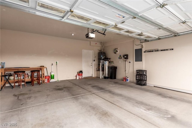 garage featuring electric panel and a garage door opener