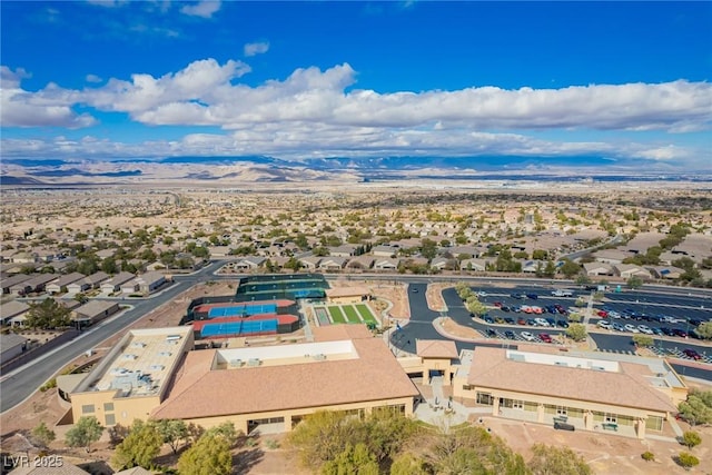 birds eye view of property with a residential view