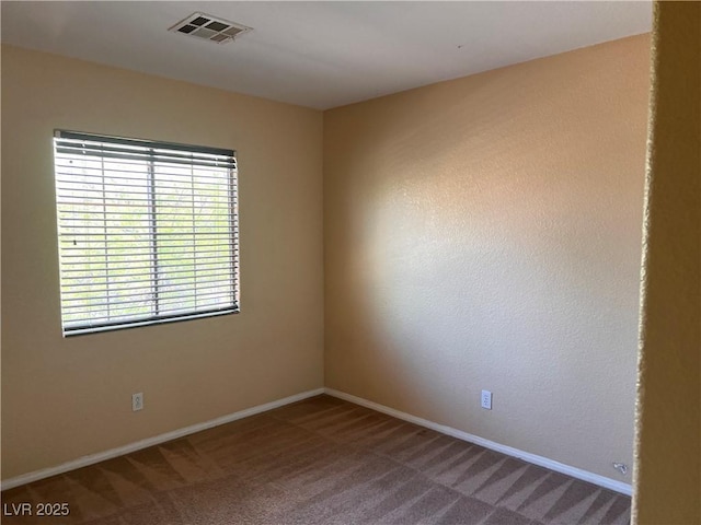 8301 Strawberry Spring St, Las Vegas, NV 89143 - unfurnished room with carpet floors and baseboards