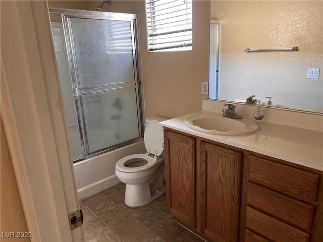8301 Strawberry Spring St, Las Vegas, NV 89143 - full bath featuring vanity, shower / bath combination with glass door, and tile patterned floors