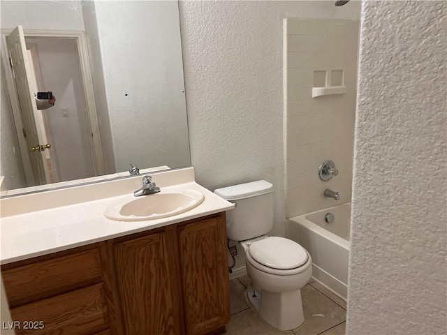 8301 Strawberry Spring St, Las Vegas, NV 89143 - full bath with a textured wall, vanity,  shower combination, and tile patterned floors