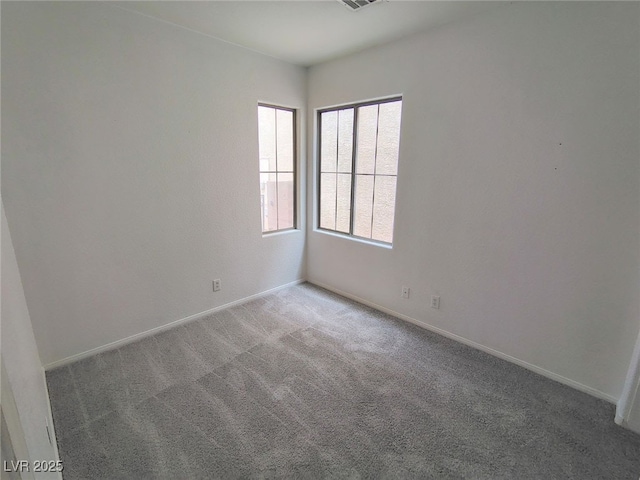 8301 Strawberry Spring St, Las Vegas, NV 89143 - unfurnished room with carpet floors and baseboards