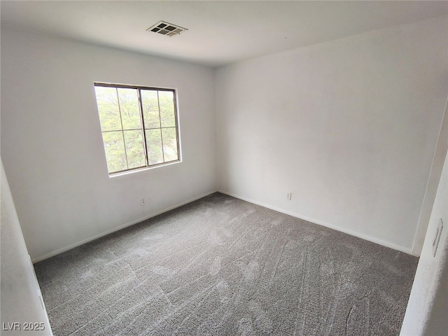 8301 Strawberry Spring St, Las Vegas, NV 89143 - carpeted spare room with baseboards