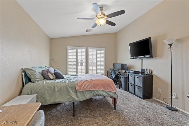 bedroom with visible vents, a ceiling fan, carpet floors, baseboards, and vaulted ceiling