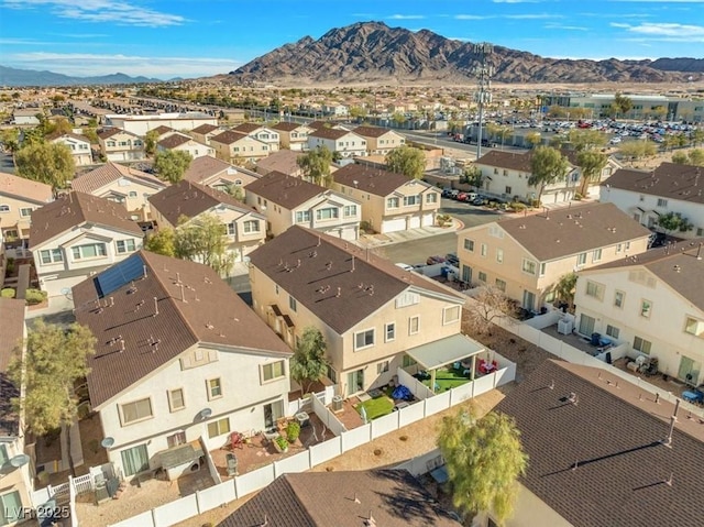 aerial view featuring a mountain view and a residential view