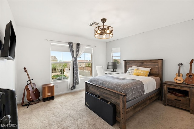 bedroom with baseboards, visible vents, a chandelier, and light carpet