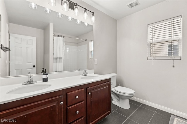 full bath featuring a sink, visible vents, toilet, and tile patterned flooring