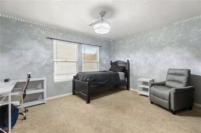 bedroom with baseboards and carpet floors