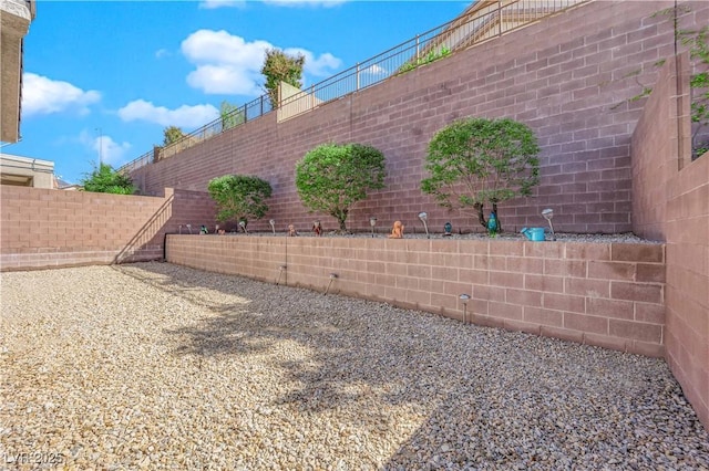 view of yard with fence