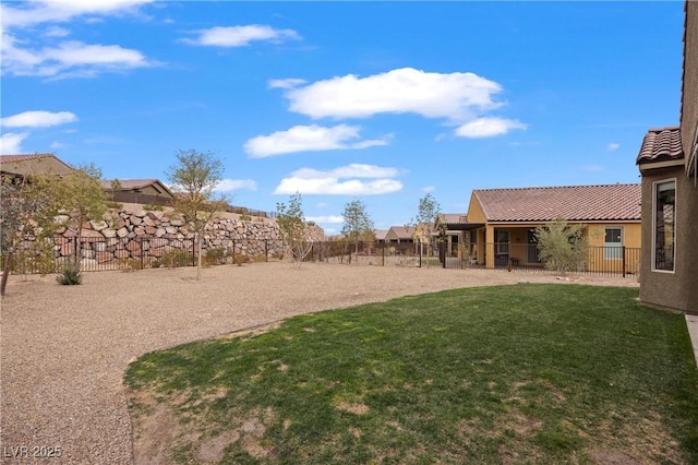 view of yard with a fenced backyard