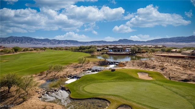 surrounding community featuring a water and mountain view and golf course view