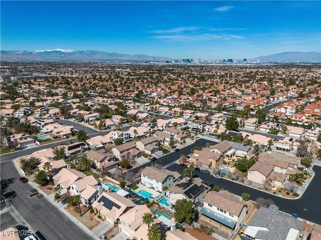 bird's eye view with a residential view and a mountain view