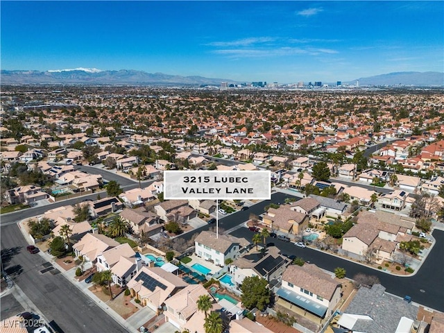 drone / aerial view with a mountain view and a residential view