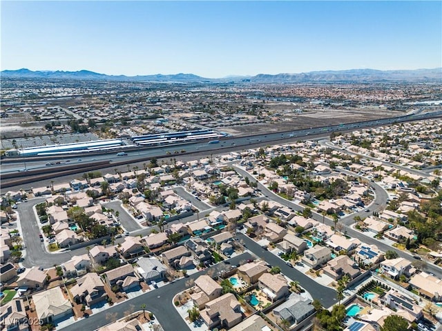 drone / aerial view featuring a mountain view