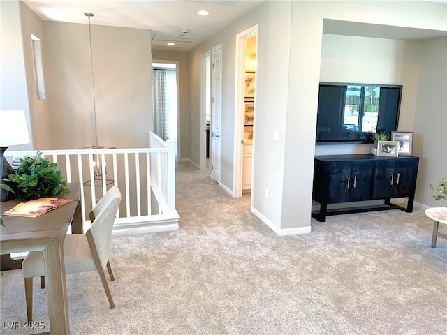 hallway featuring recessed lighting, baseboards, and carpet floors