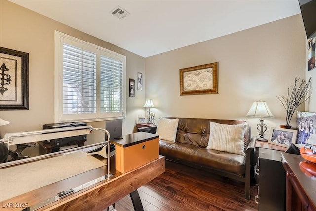 office with visible vents and wood finished floors