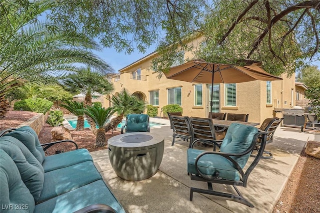 view of patio / terrace with an outdoor pool