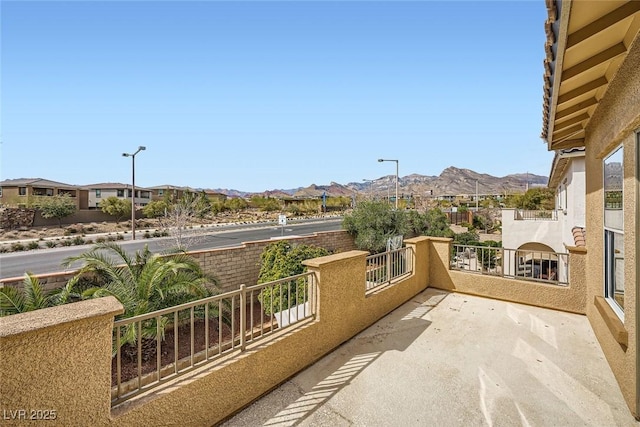 balcony featuring a mountain view