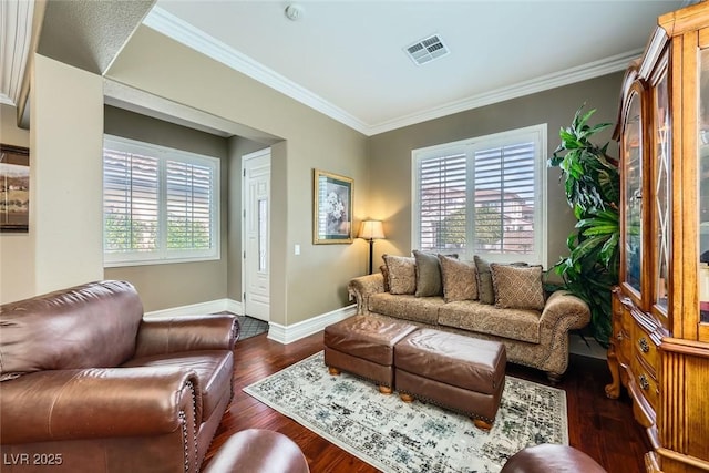 living area with visible vents, dark wood-style floors, baseboards, and ornamental molding